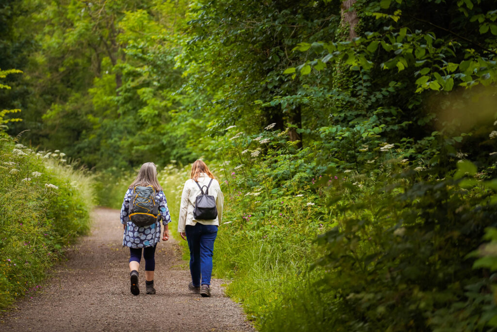 Walkers on a Peak District path near Callow Top Holiday Park